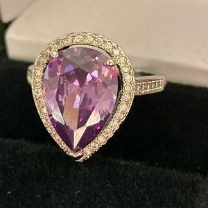 Stunning purple pear halo ring